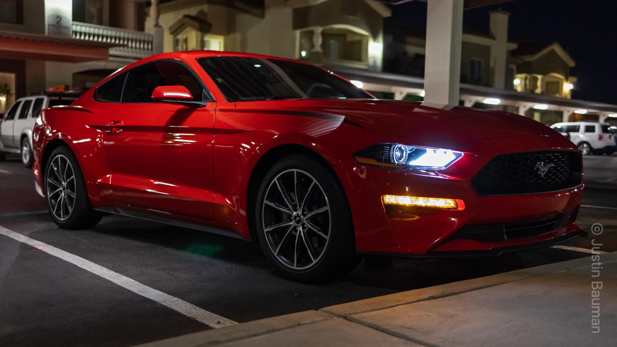 Red Mustang shot from the side